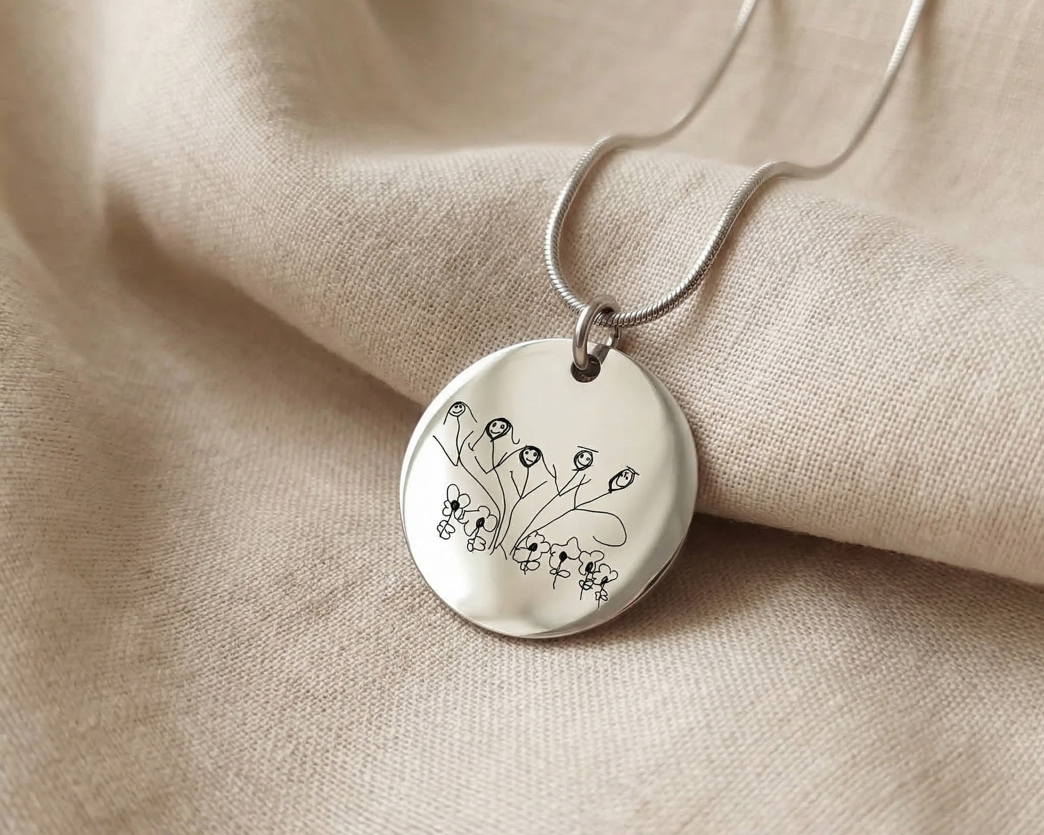 Silver kids drawing necklace with custom engraved artwork on pendant