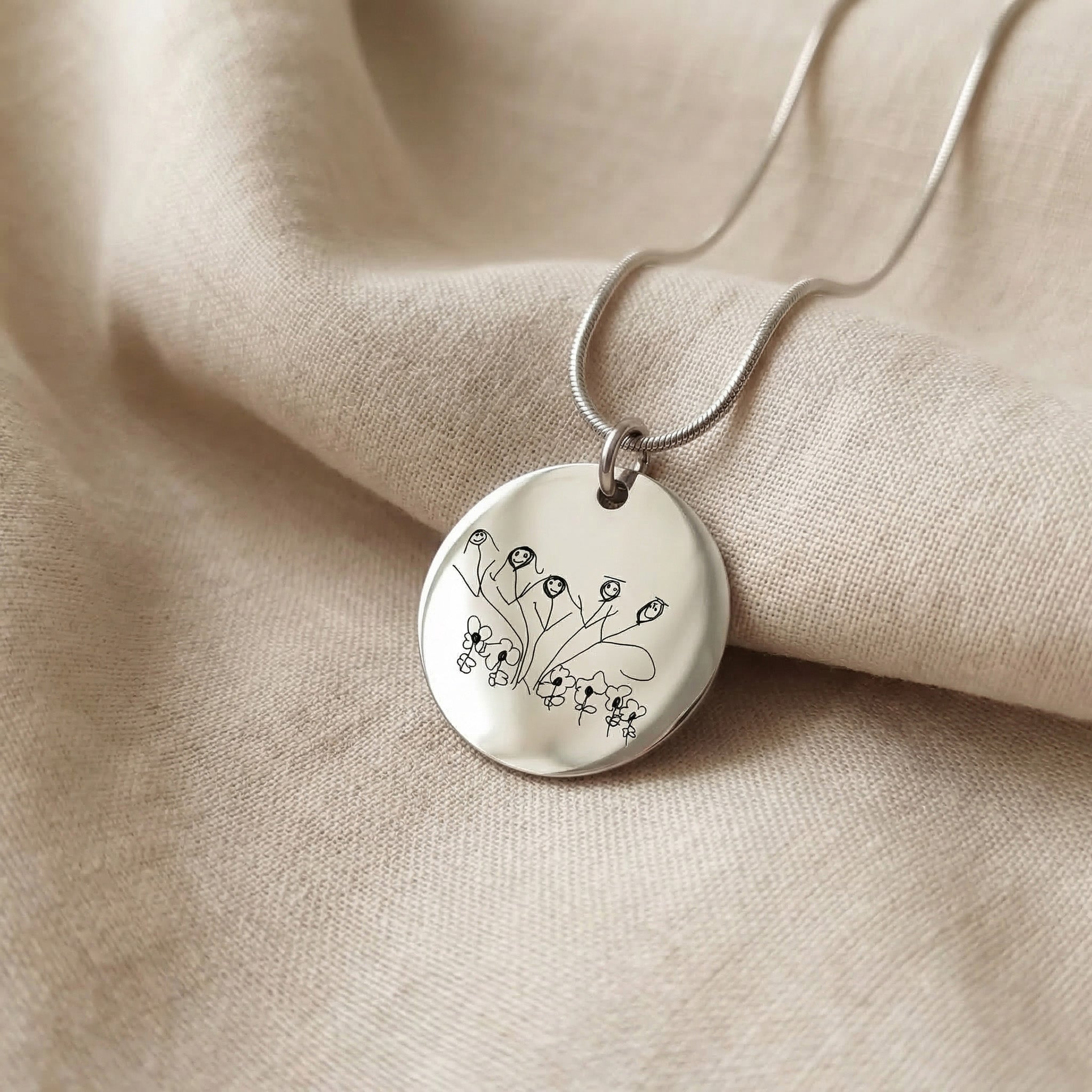Silver kids drawing necklace with custom engraved artwork on pendant