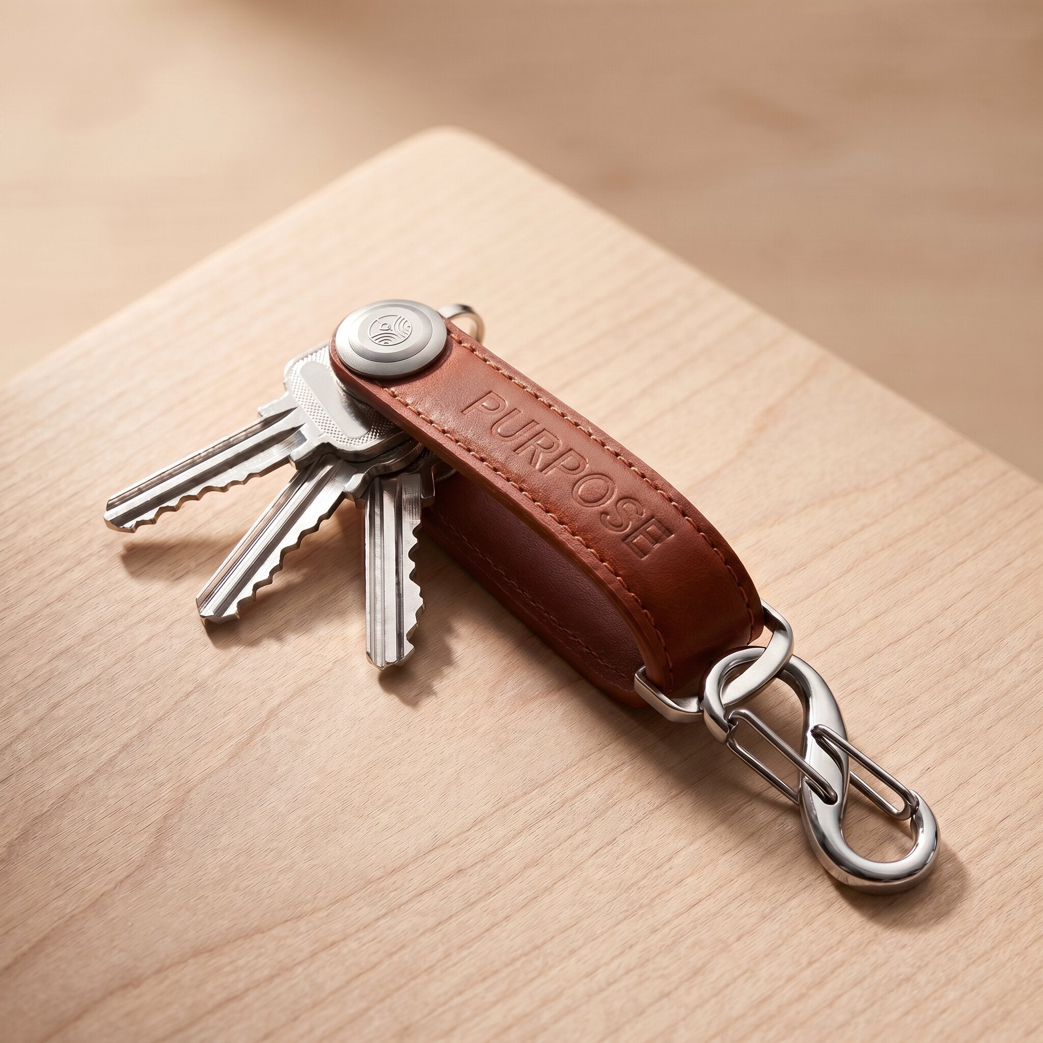 Leather key organizer in brown with compact key holder design, practical everyday carry accessory