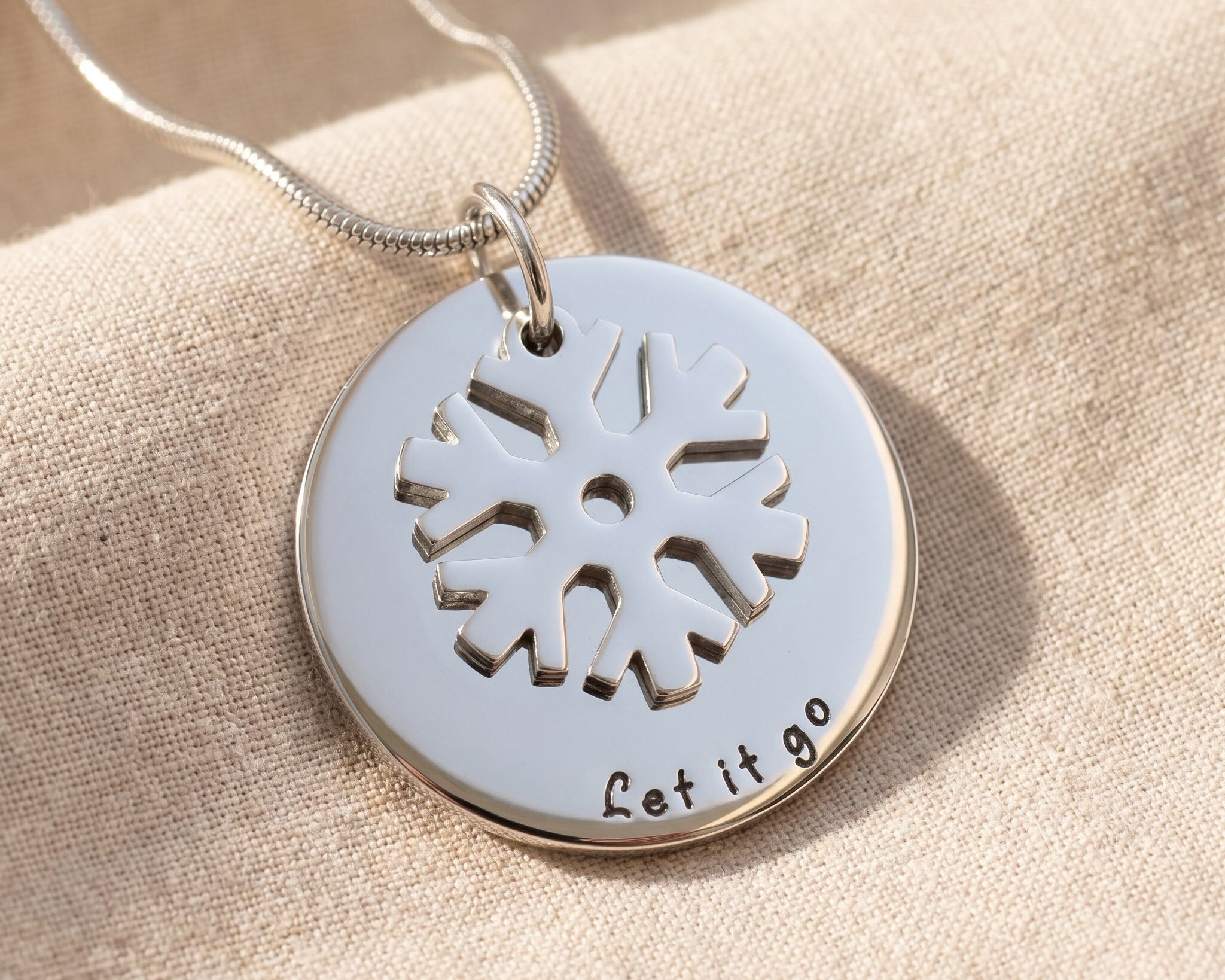 Let it go necklace in silver with snowflake charm, meaningful holiday gift for her