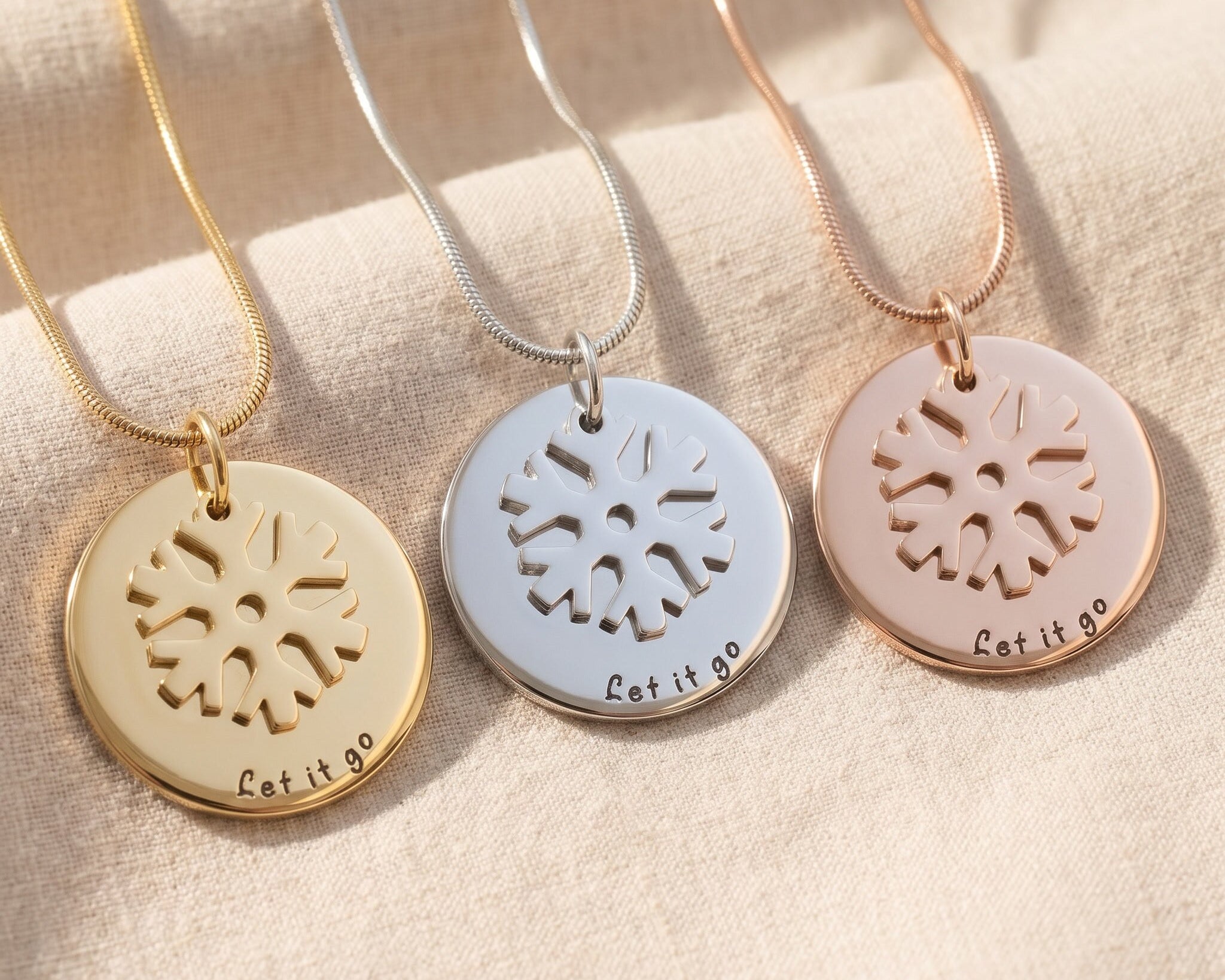 Let it go necklace tone comparison showing gold, silver and rose gold symbolic keepsake jewellery finishes