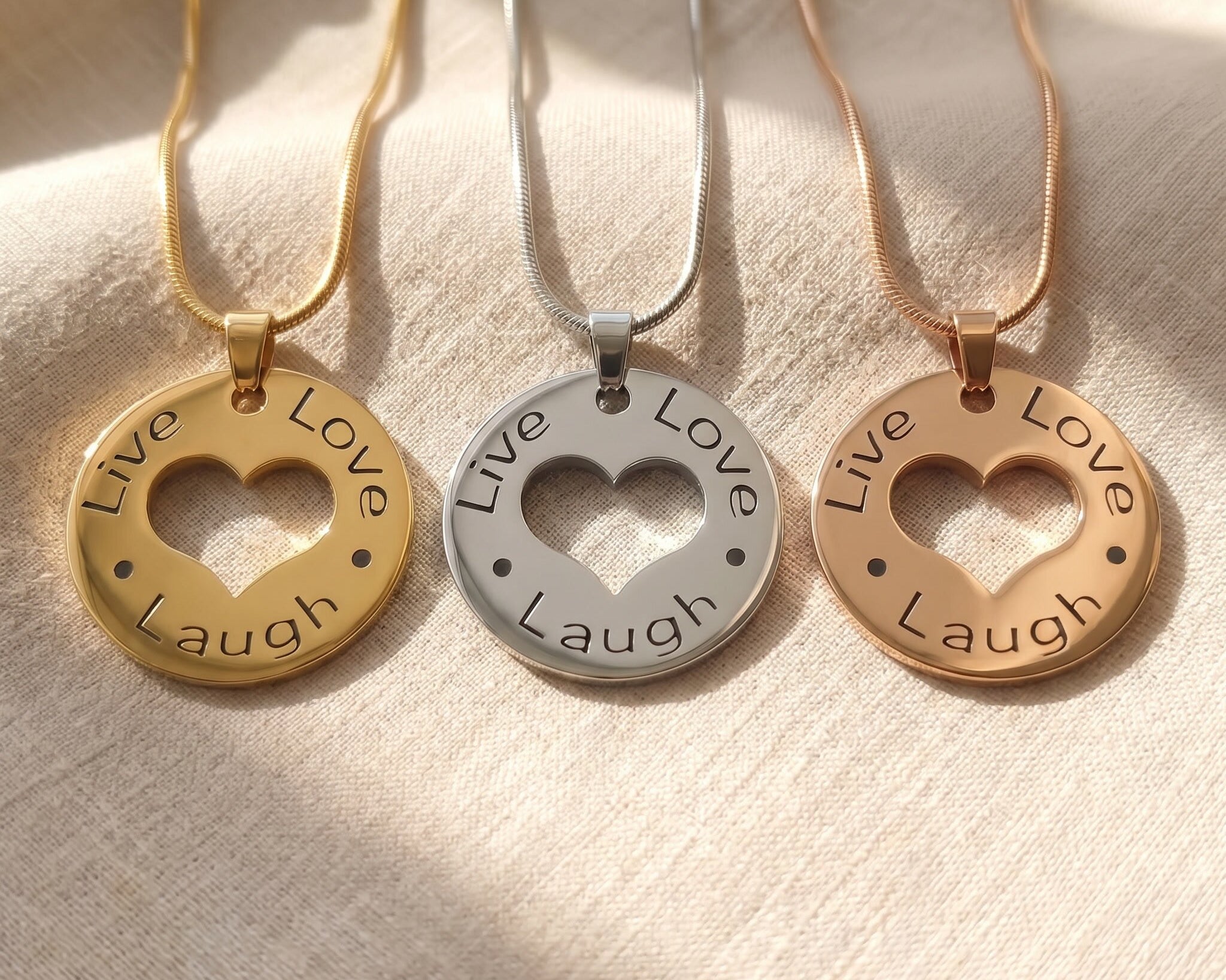 Live laugh love necklace tone comparison showing gold, silver and rose gold engraved finishes