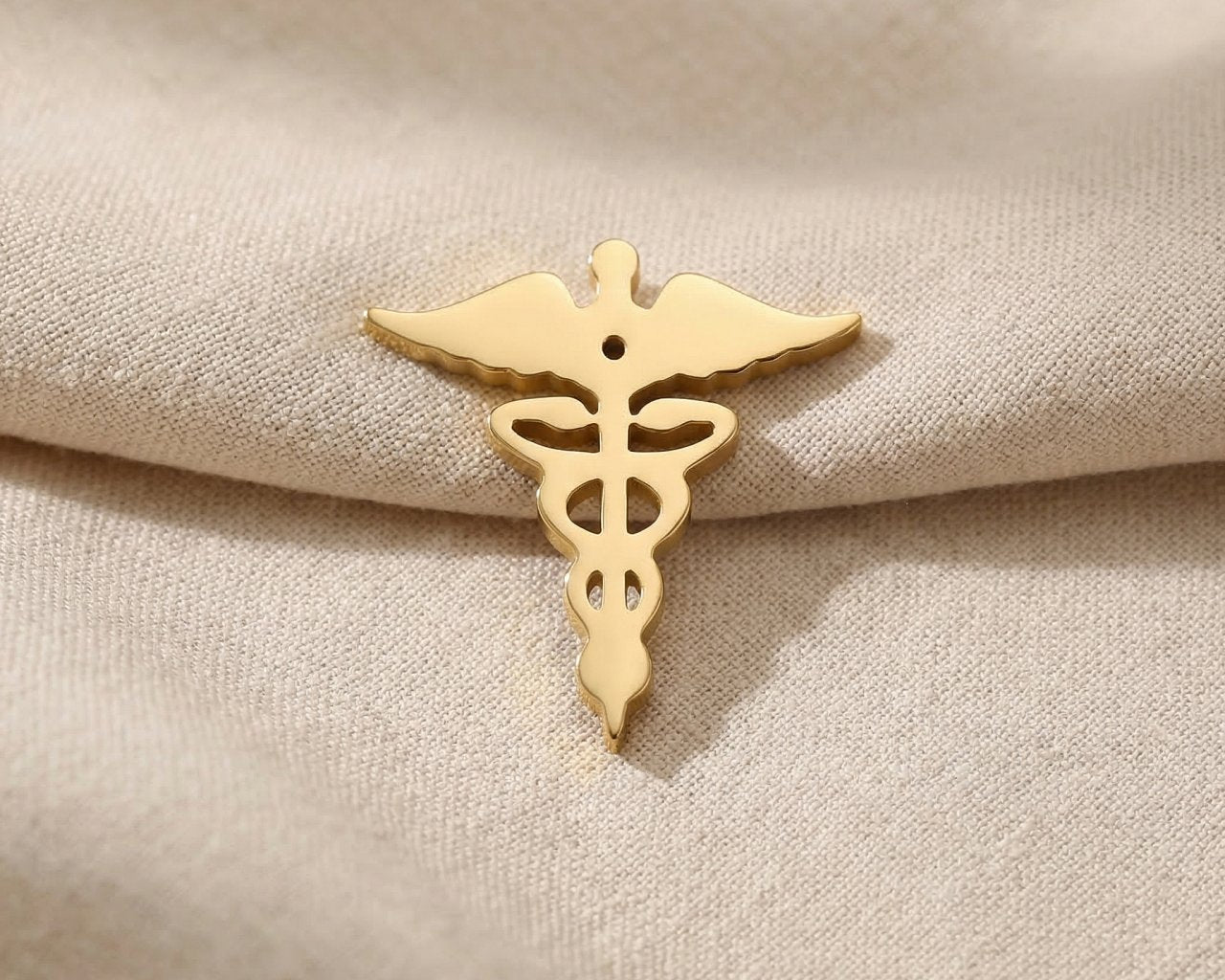 Gold medical symbol charm for Dream Locket bracelet honoring healthcare professionals and medical journeys