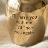 Close-up of Mini Personalised Keepsake Urn showing engraved message and polished finish