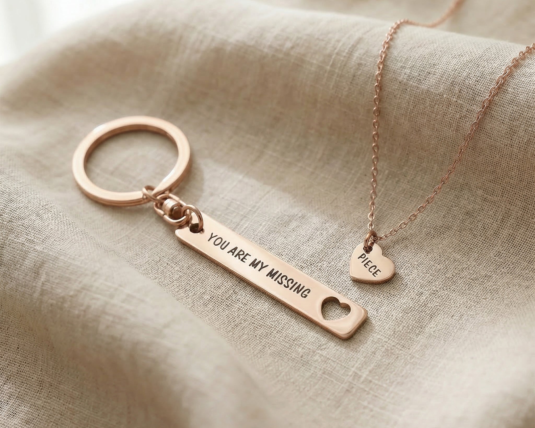 Missing piece set in rose gold with matching necklace and keyring pieces
