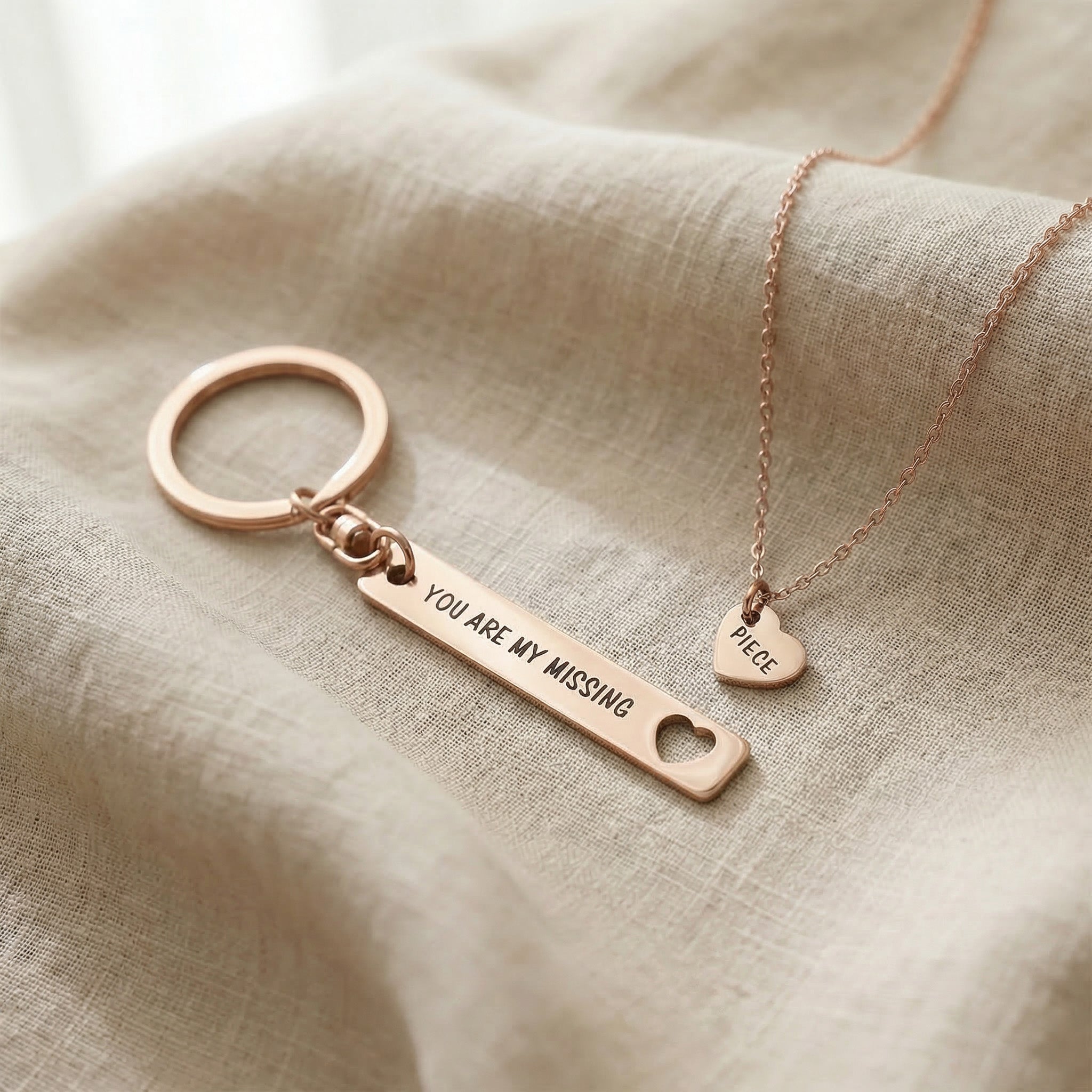 Missing piece set in rose gold with matching necklace and keyring pieces