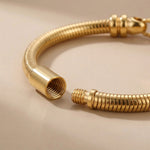 Close-up of moments charm bracelet showing threaded design and clasp detail