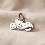 Silver motorbike charm for keyring symbolizing freedom, adventure, and passion for motorcycle journeys