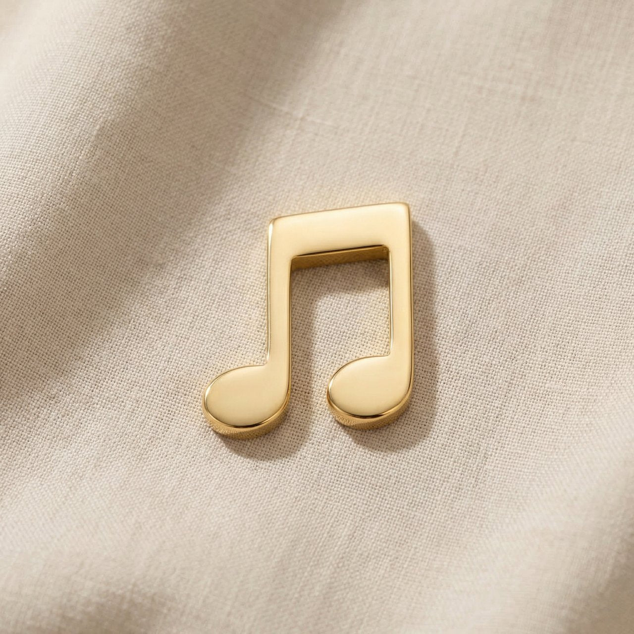 Gold music note charm for Dream Locket bracelet symbolizing passion for music, creativity, and meaningful memories