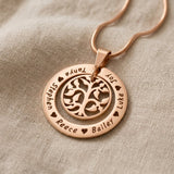 Rose gold My Family Tree necklace with circular tree of life pendant designons