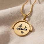 Spinning name necklace in gold with personalised engraving, hidden message keepsake jewellery