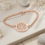 Belle Fever my tree bracelet rose gold flat lay, personalised engraved names around pendant, meaningful tree of life jewellery gift for mum, family keepsake.