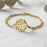 Belle Fever my tree bracelet gold on neutral background, custom engraved tree of life pendant, personalised family name bracelet gift, timeless keepsake jewellery.