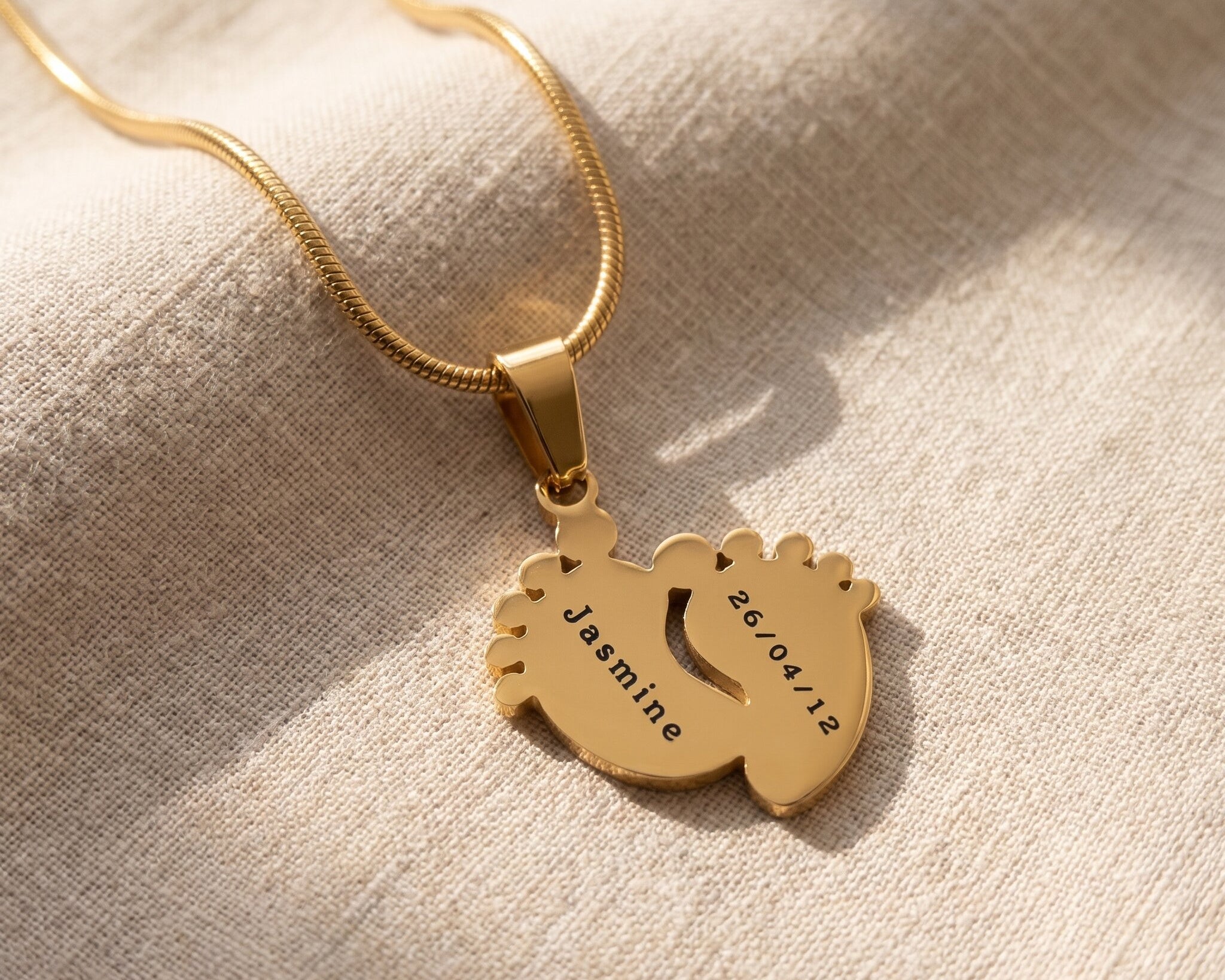 New life necklace in gold with engraved detail, meaningful symbolic jewellery design
