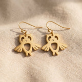 Owl earrings in gold with detailed design, symbolic jewellery for wisdom and thoughtful gift for her