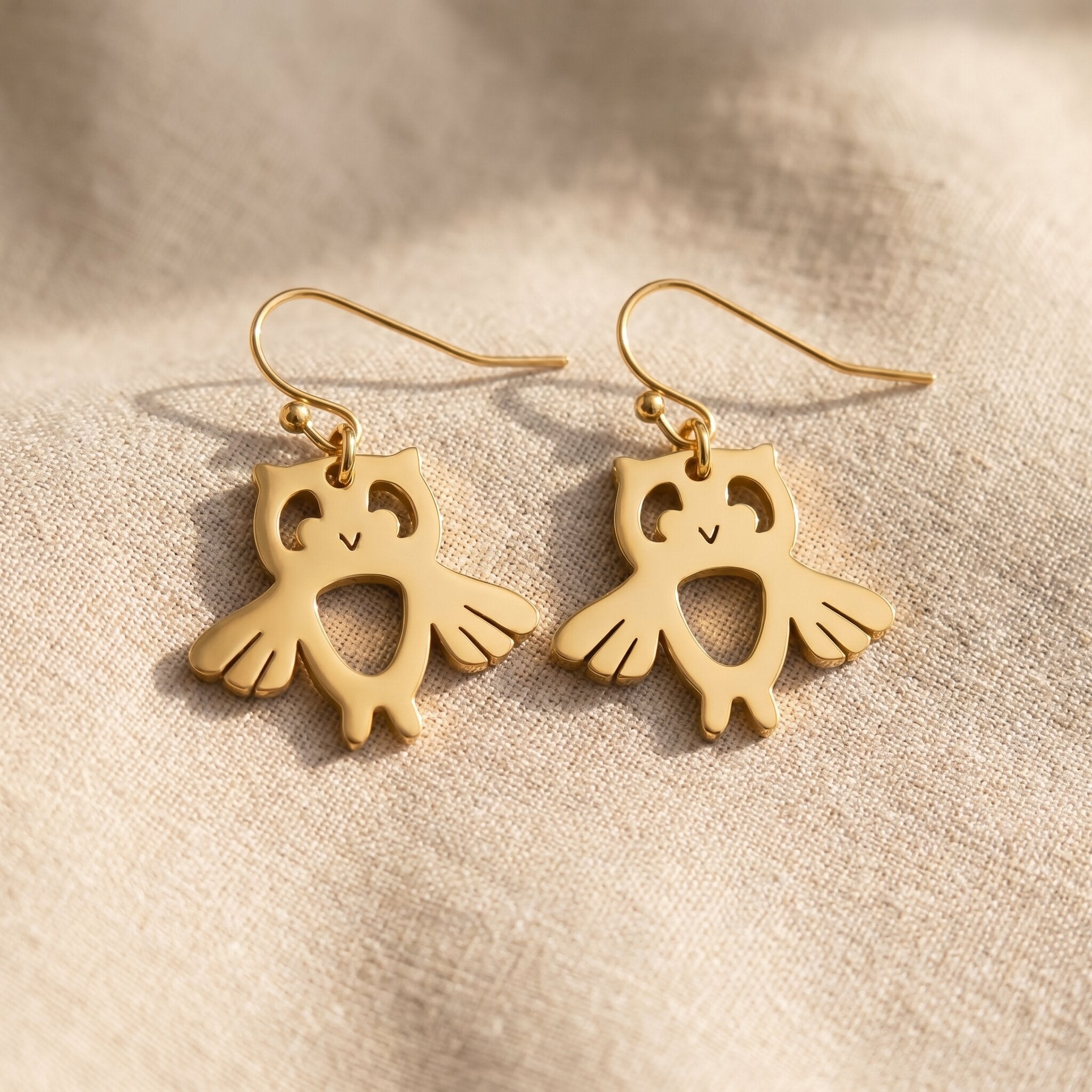 Owl earrings in gold with detailed design, symbolic jewellery for wisdom and thoughtful gift for her