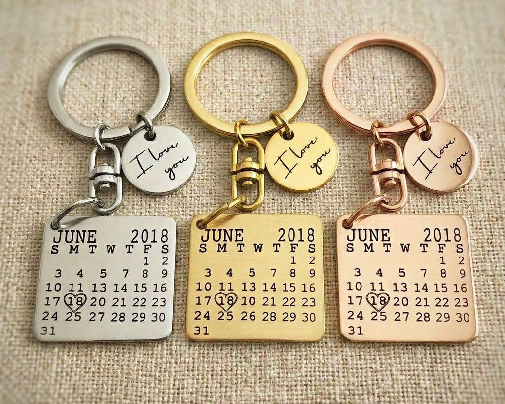 Personalised calendar keyring in gold, silver and rose gold finishes with engraved calendar design
