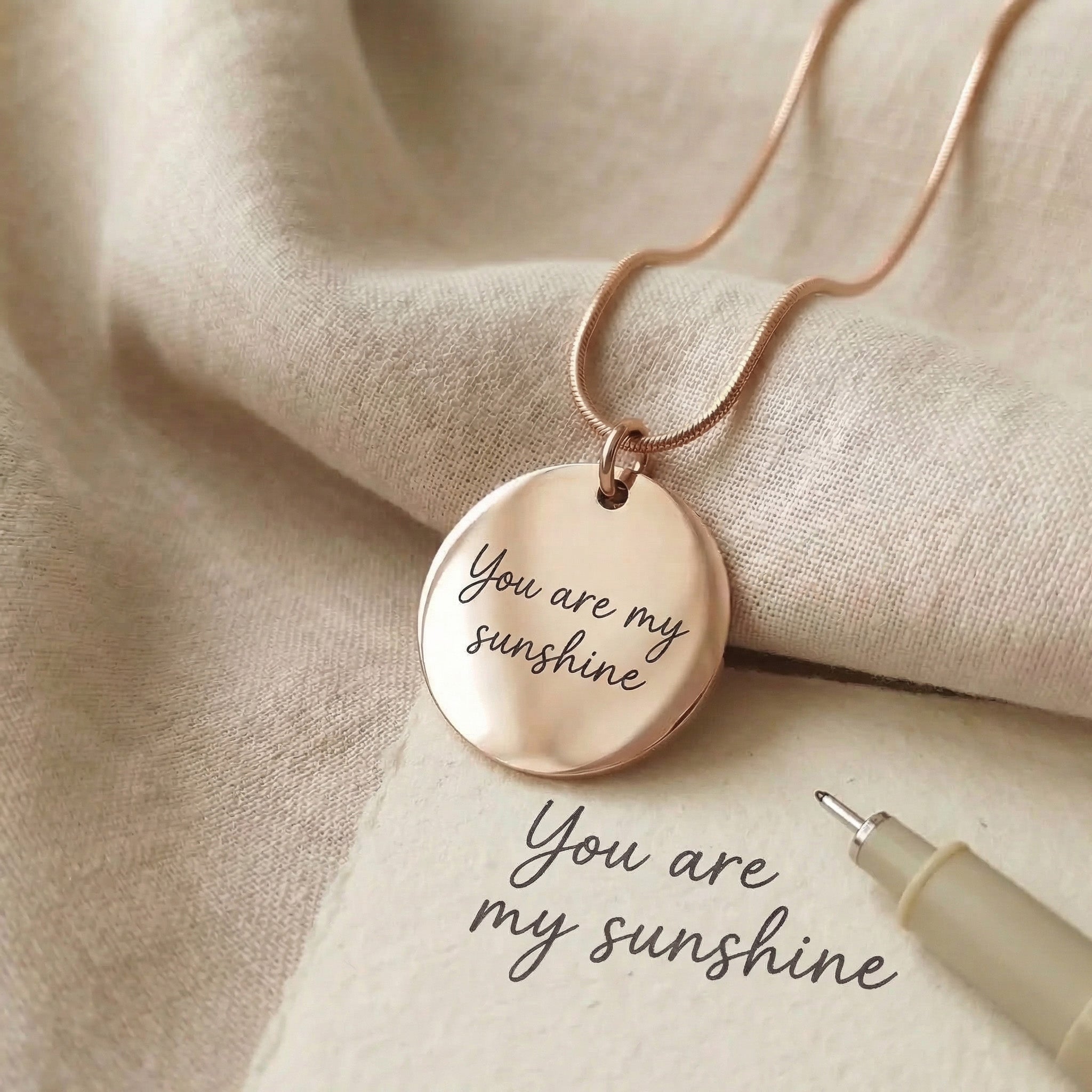 Personalised Disc Pendant showing handwriting message engraving options