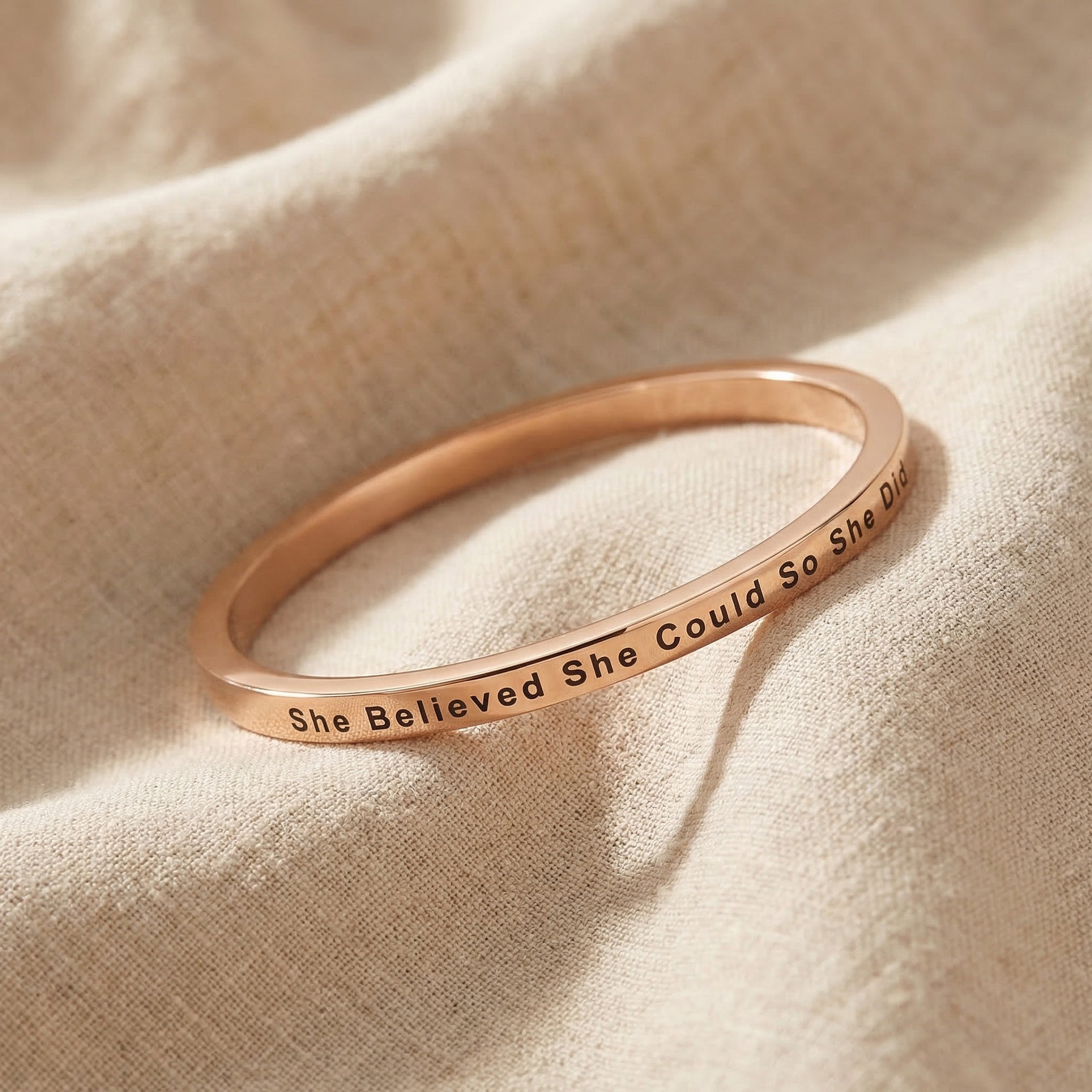 Personalised inspirational bangle in rose gold with engraved message, refined design
