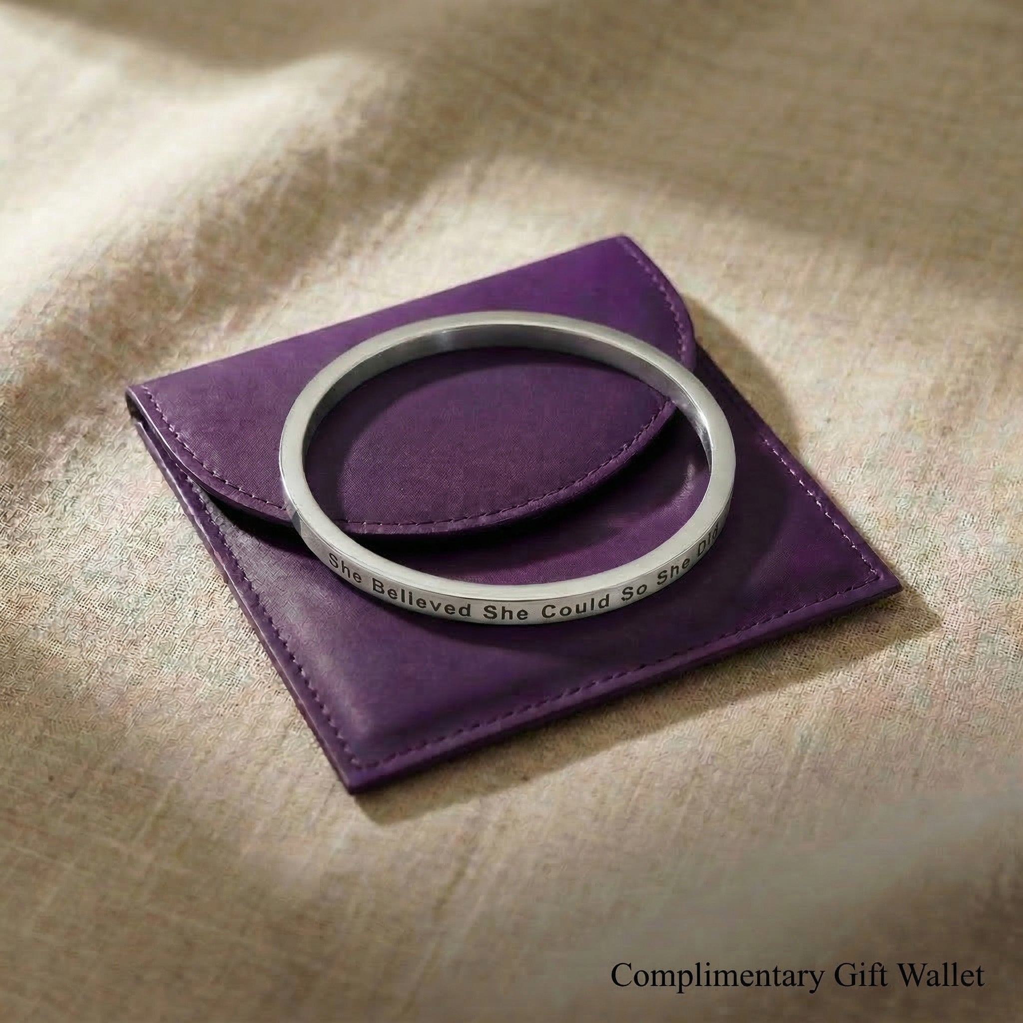 Personalised inspirational bangle displayed with gift wallet packaging, meaningful jewellery gift