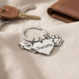 Personalised keyring charms with engraved names and symbol charms, meaningful keepsake set