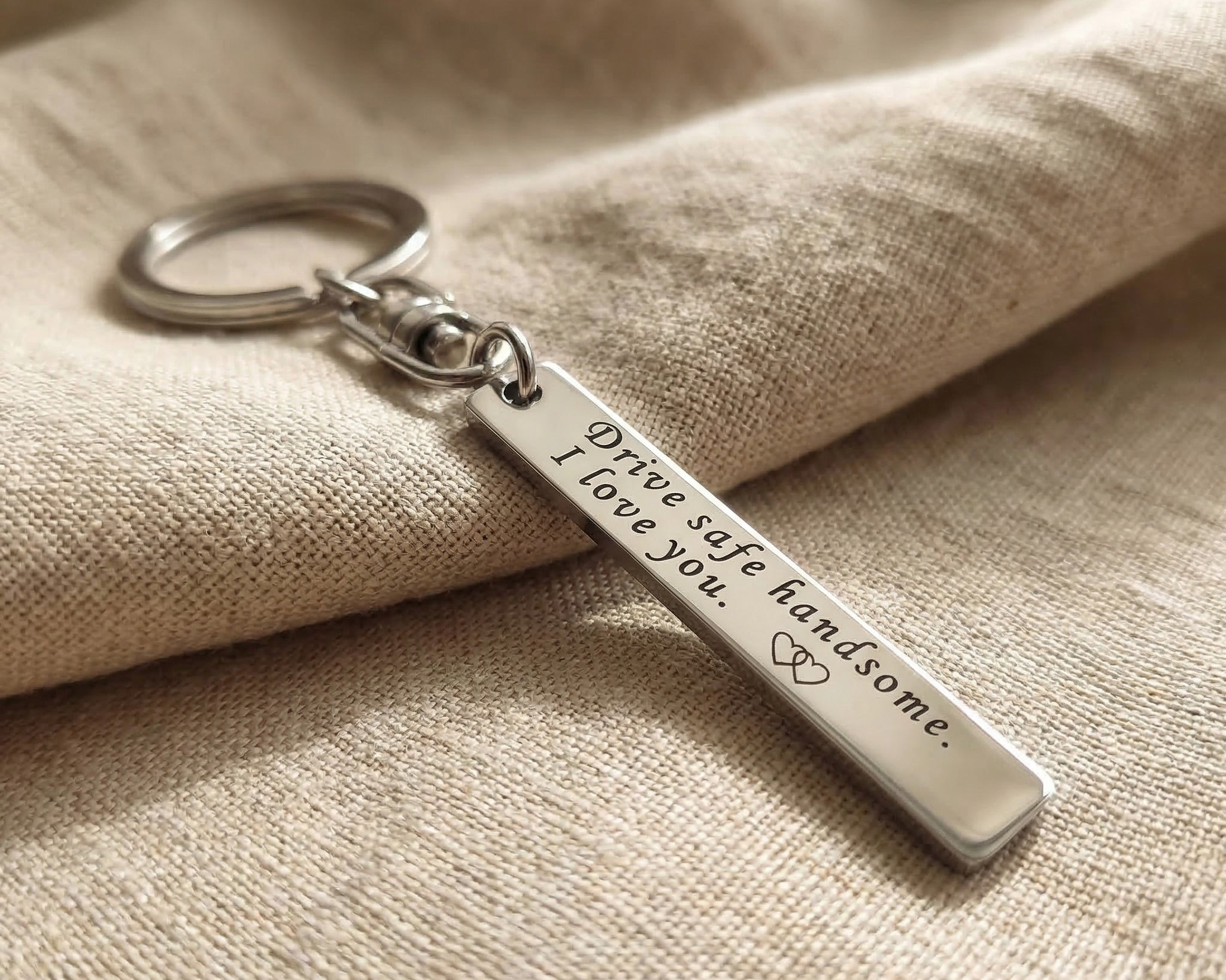 Personalised tag keyring in silver with engraved message, classic minimalist style