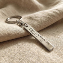 Personalised tag keyring in silver with engraved message, classic minimalist style