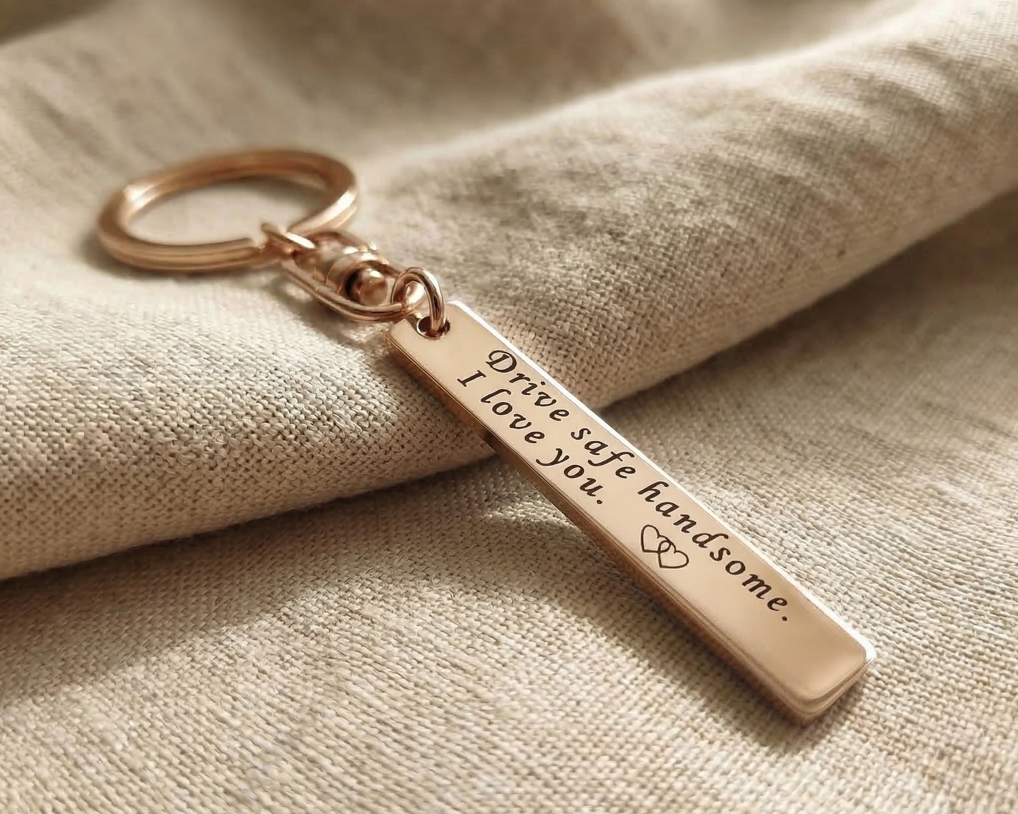 Personalised tag keyring in rose gold with engraved message, elegant gift design