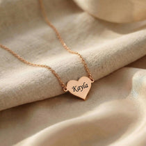 Personalised heart necklace in rose gold with engraved name, delicate everyday jewellery