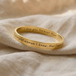 Video showing personalised promise bangle with engraved message and polished finish detail