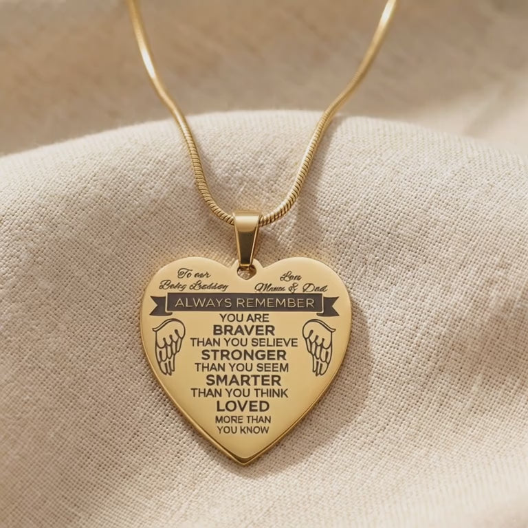 Video showing personalised heart necklace with engraved message and polished finish detail