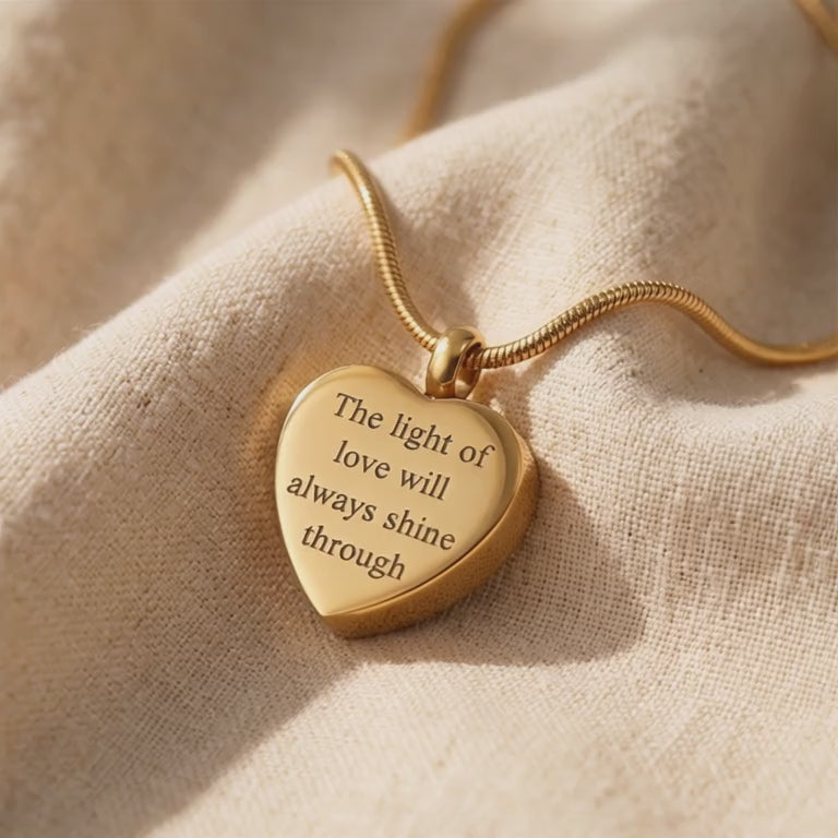 Heart Cremation Necklace with engraved message shown in close-up product view