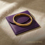 Personalised promise bangle displayed with gift wallet packaging, meaningful gift option