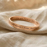 Personalised promise bangle in rose gold with engraved message, refined jewellery design