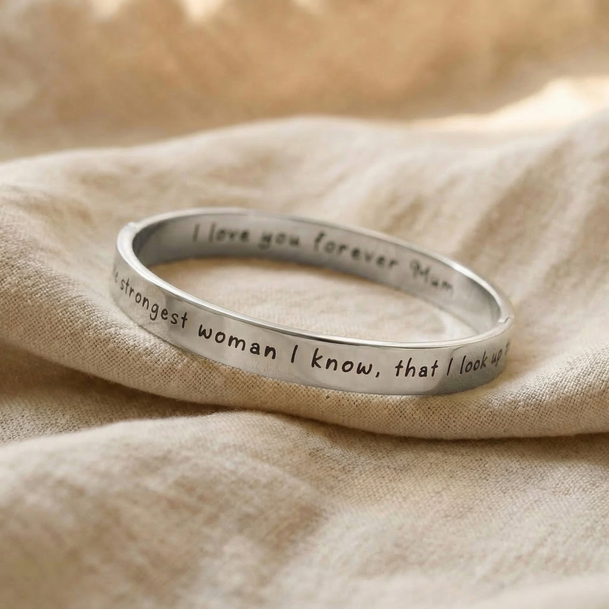 Personalised promise bangle in silver with engraved message, classic minimalist style