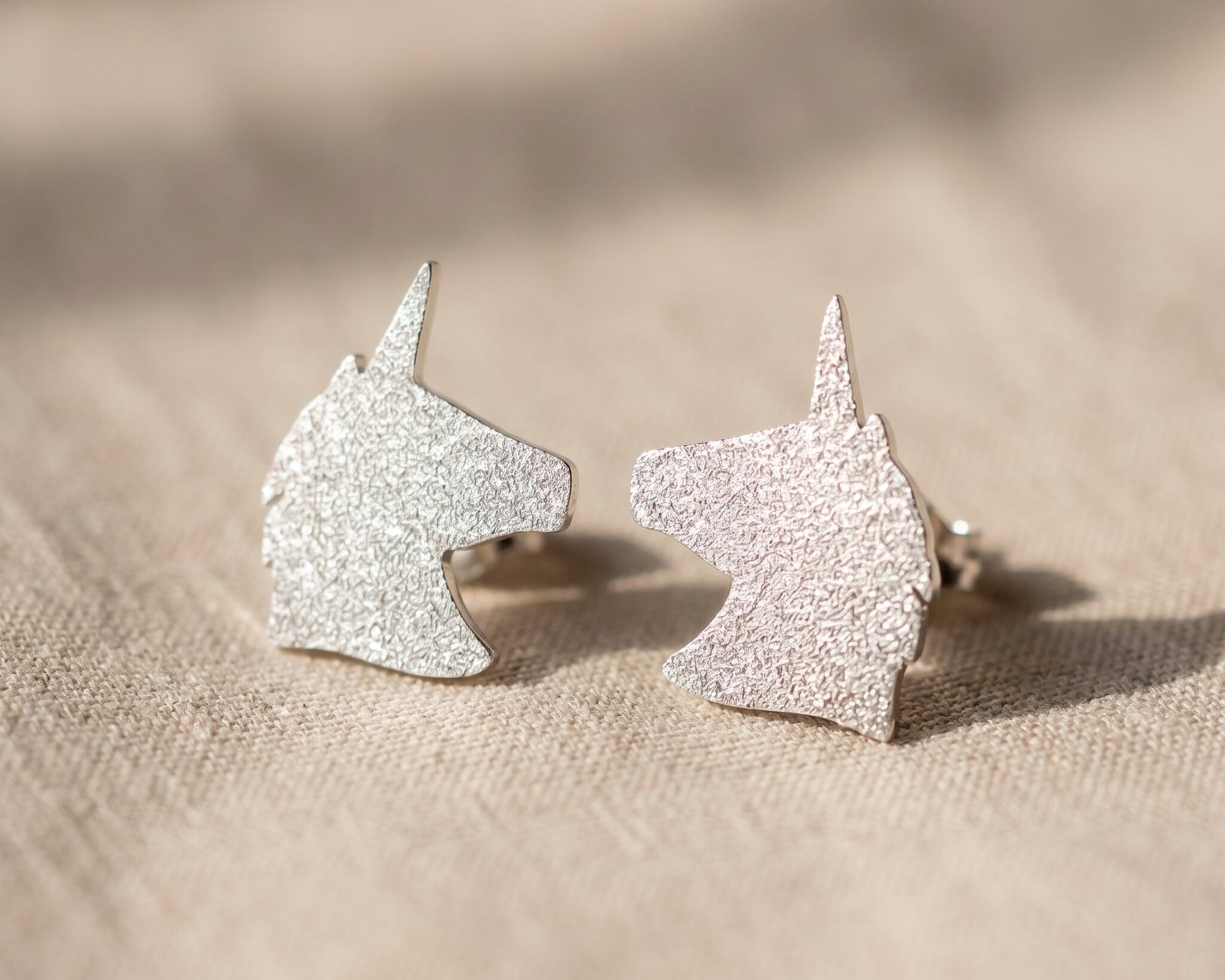 Sparkling unicorn earrings in silver with glitter detail, cute fantasy jewellery gift idea