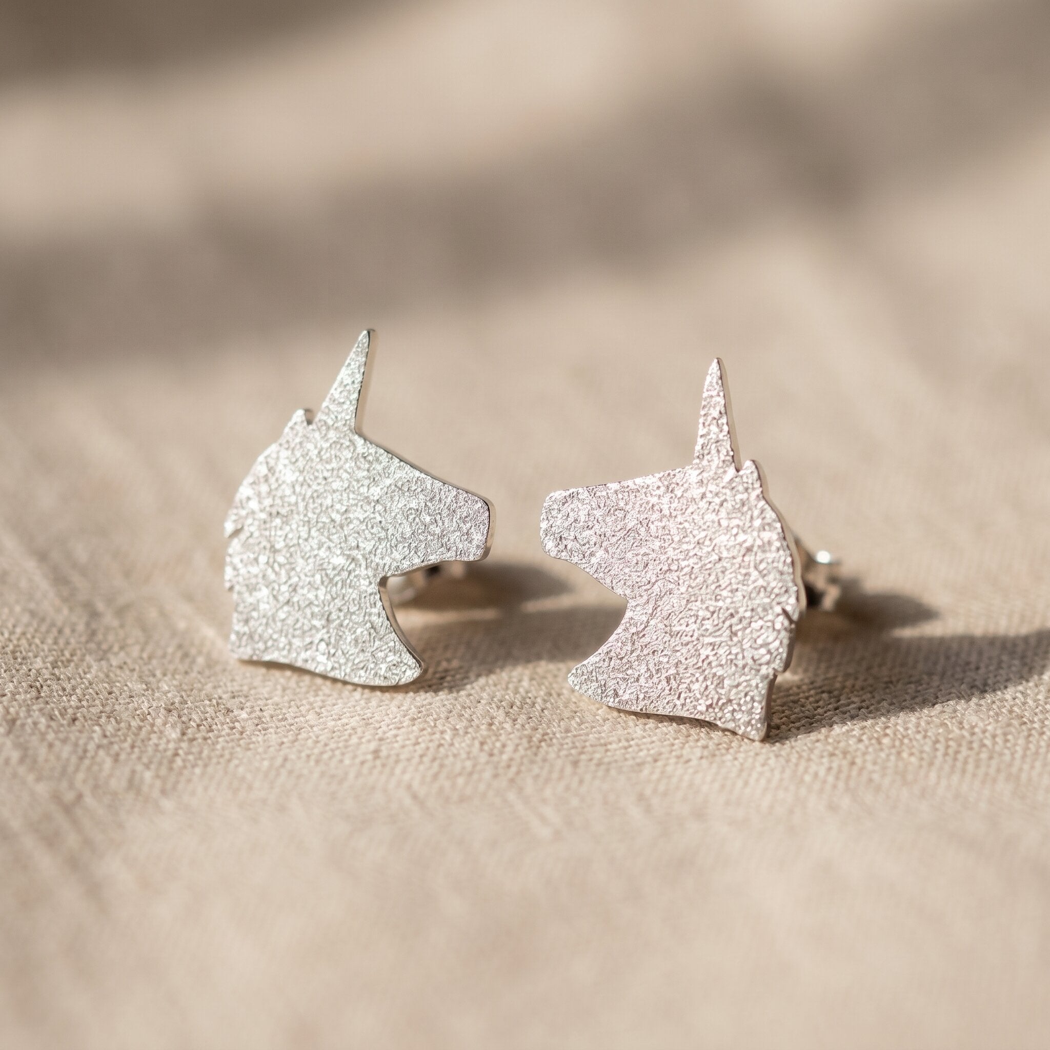 Sparkling unicorn earrings in silver with glitter detail, cute fantasy jewellery gift idea
