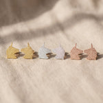 Sparkling unicorn earrings tone comparison showing gold, silver and rose gold cute jewellery options