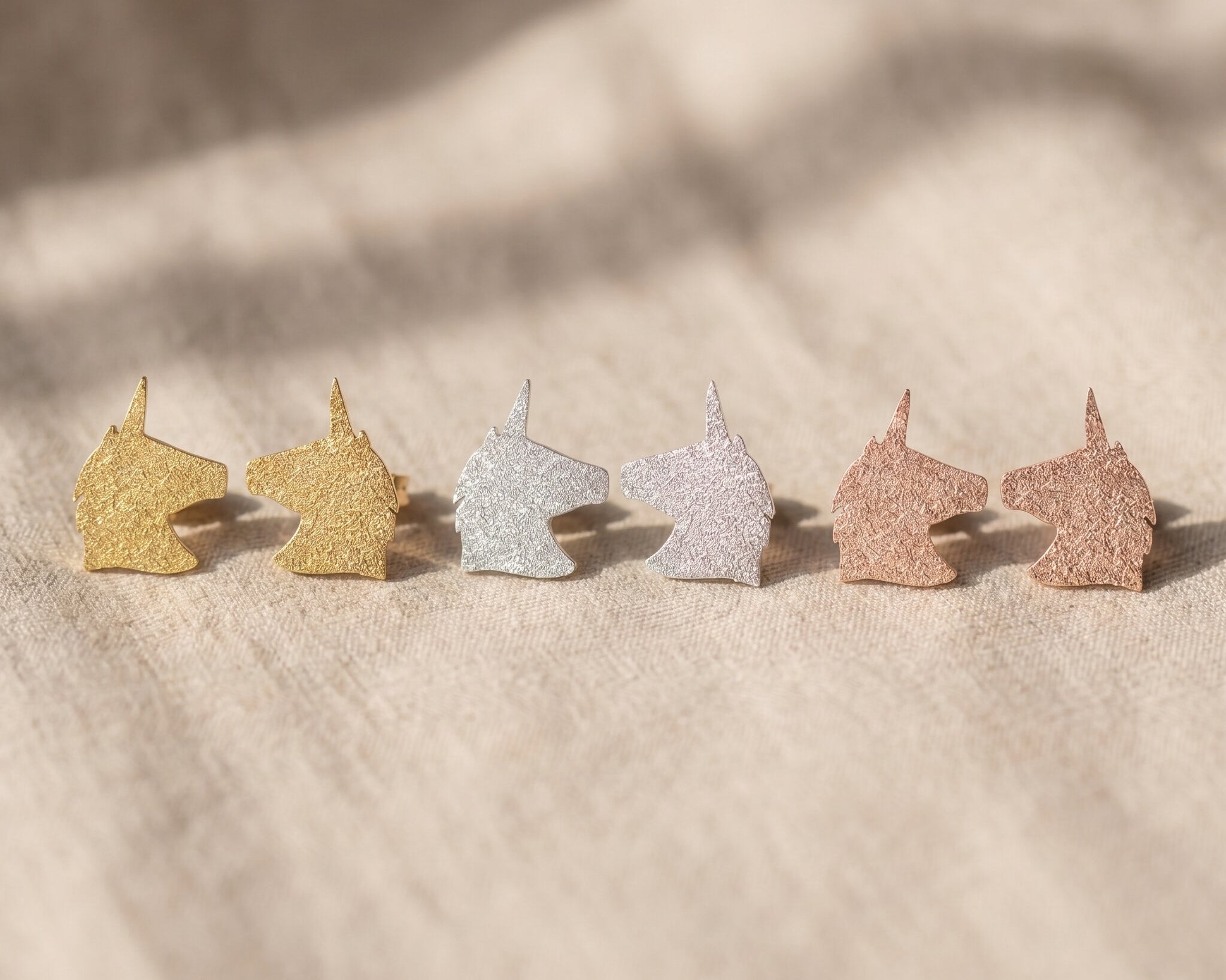 Sparkling unicorn earrings tone comparison showing gold, silver and rose gold cute jewellery options