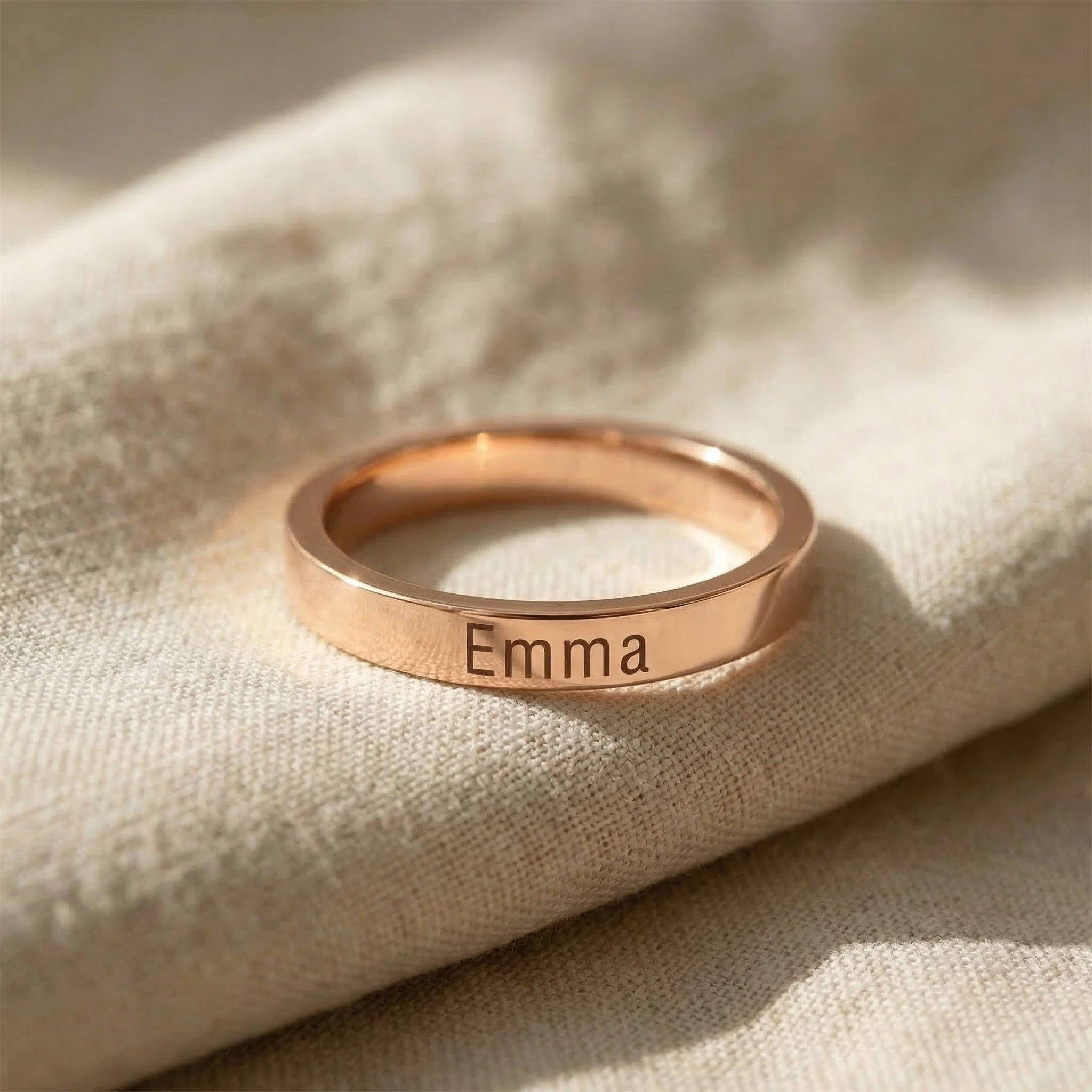 Personalised stackable ring in rose gold with engraved name, delicate jewellery design
