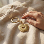 Hand holding teacher keyring, meaningful thank you teacher gift and appreciation keepsake