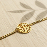 Belle Fever tree bracelet in gold finish with round cutout charm detail. perfect gift for mom 