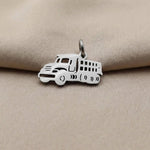Silver truck charm for keyring symbolizing hard work, travel journeys, and memorable everyday adventures