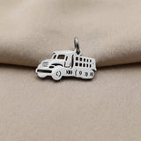 Silver truck charm for keyring symbolizing hard work, travel journeys, and memorable everyday adventures