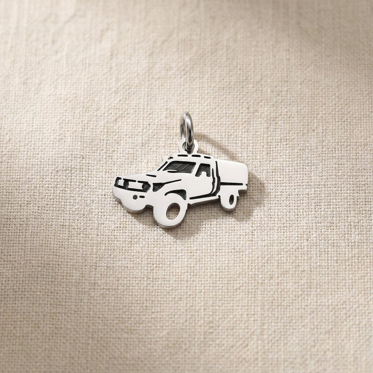 Silver ute canopy charm for keyring representing outdoor adventures, utility vehicles, and rugged lifestyle memories