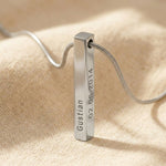 Vertical bar necklace showing engraving customization options on bar pendant