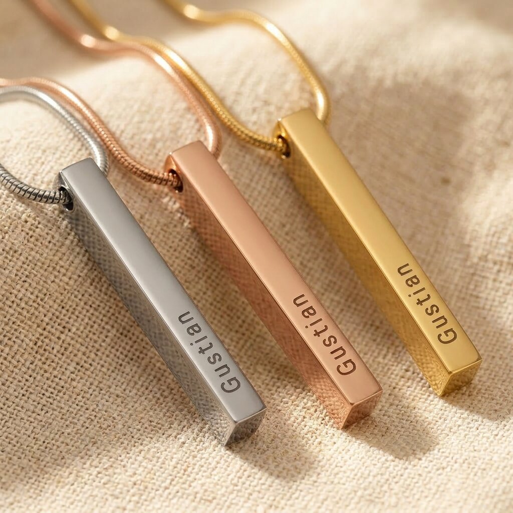 Vertical bar necklace in gold silver and rose gold finishes with engraved bar pendant