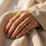 Woman wearing wisdom ring, refined minimalist jewellery for everyday wear and meaningful gifting